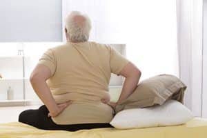 Obese man with back pain is planning weight loss surgery