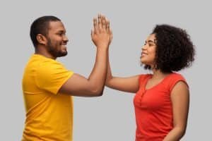 couple high five